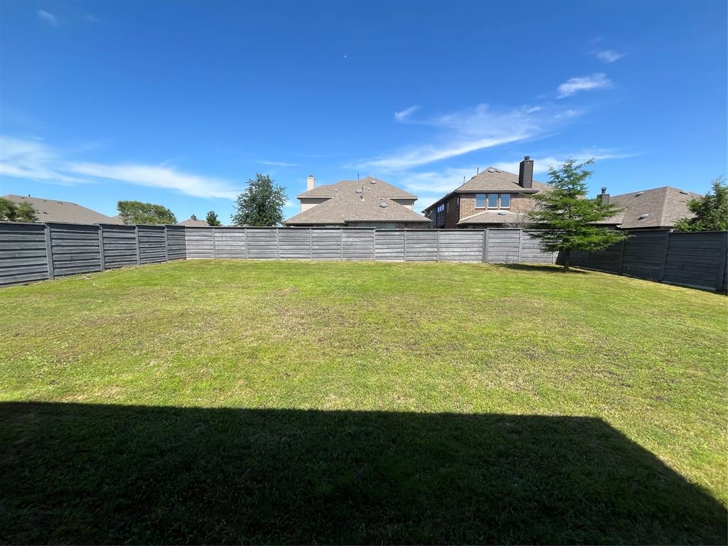 7040 Cross Point Lane Little Elm, TX 76227 - Photo 6 of 16 a view of an ocean and beach