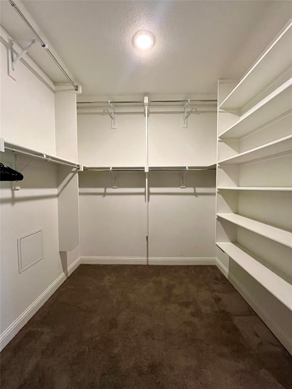 7040 Cross Point Lane Little Elm, TX 76227 - Photo 8 of 16 a view of a room with rack on the wall