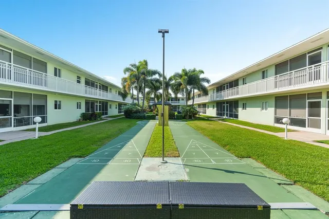 a view of an outdoor space with furniture
