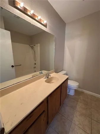 a bathroom with a shower and a bath tub