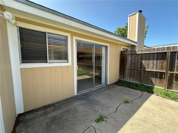 a view of a backyard with a garden