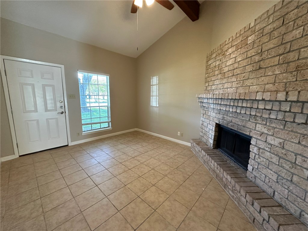 4917 Delwood Street, Unit C3 Corpus Christi, TX 78413 - Photo 2 of 24 an empty room with windows