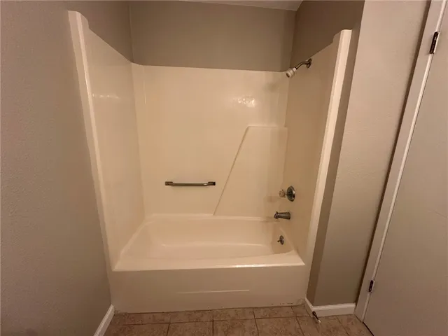 a bathroom with a sink a mirror and a toilet