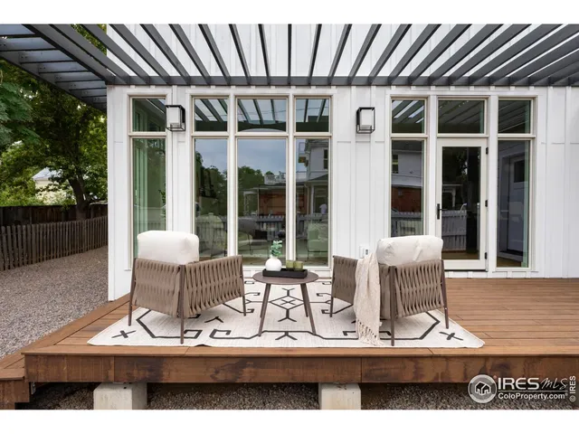 a view of house with outdoor seating space