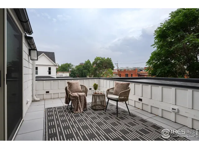 a view of roof deck with patio