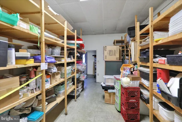 a bathroom with a sink vanity and toilet