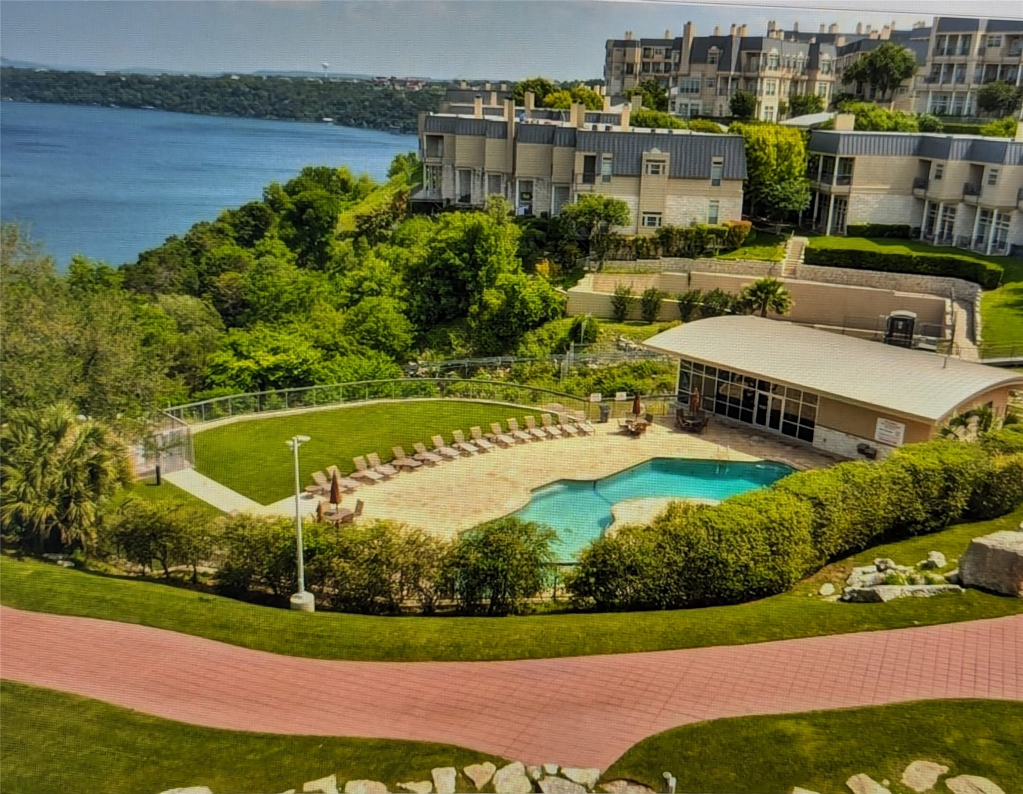 2918 Ranch Road 620 North, Unit Y194 Austin, TX 78734 - Photo 35 of 35 an aerial view of a house with a garden and lake view