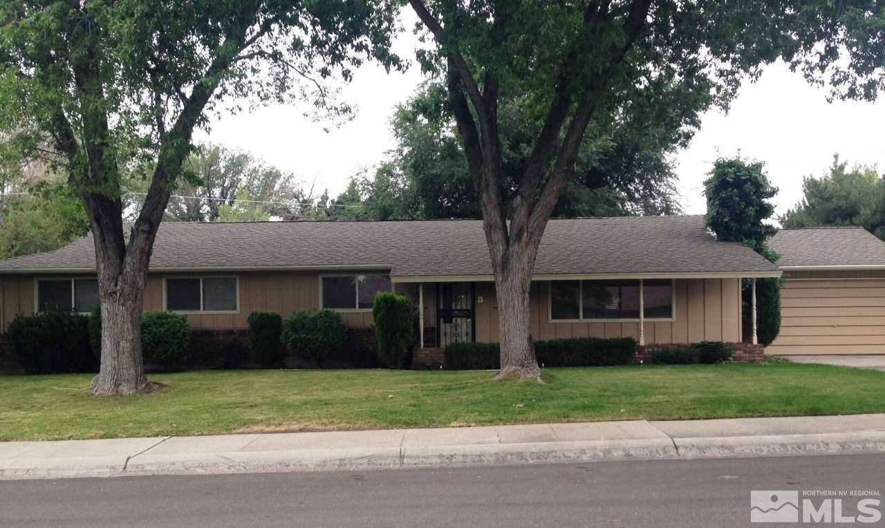 1901 Fallen Leaf Court Reno, NV 89509 - Photo 1 of 1 a house that has a tree in front of a house