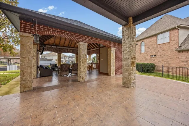 a view of a porch with seating space