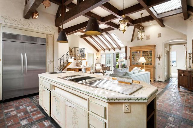 a spacious bedroom with a bed and a window