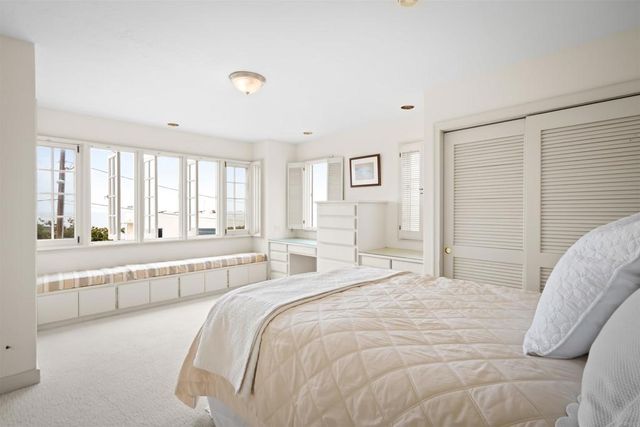 a view of a livingroom with furniture and a fireplace