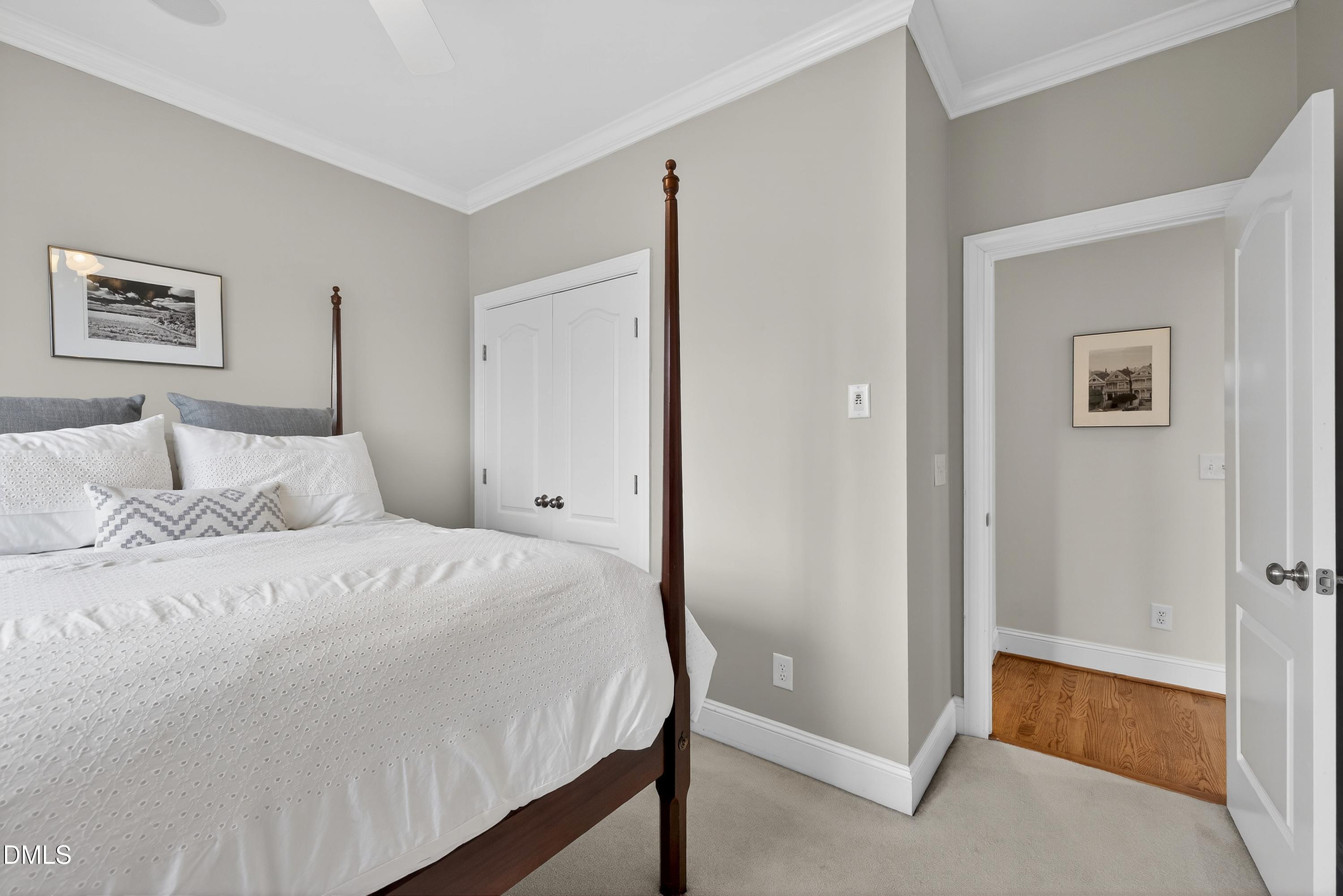 1168 Harp Street Raleigh, NC 27604 - Photo 34 of 45 a bedroom with a bed and a view of bathroom