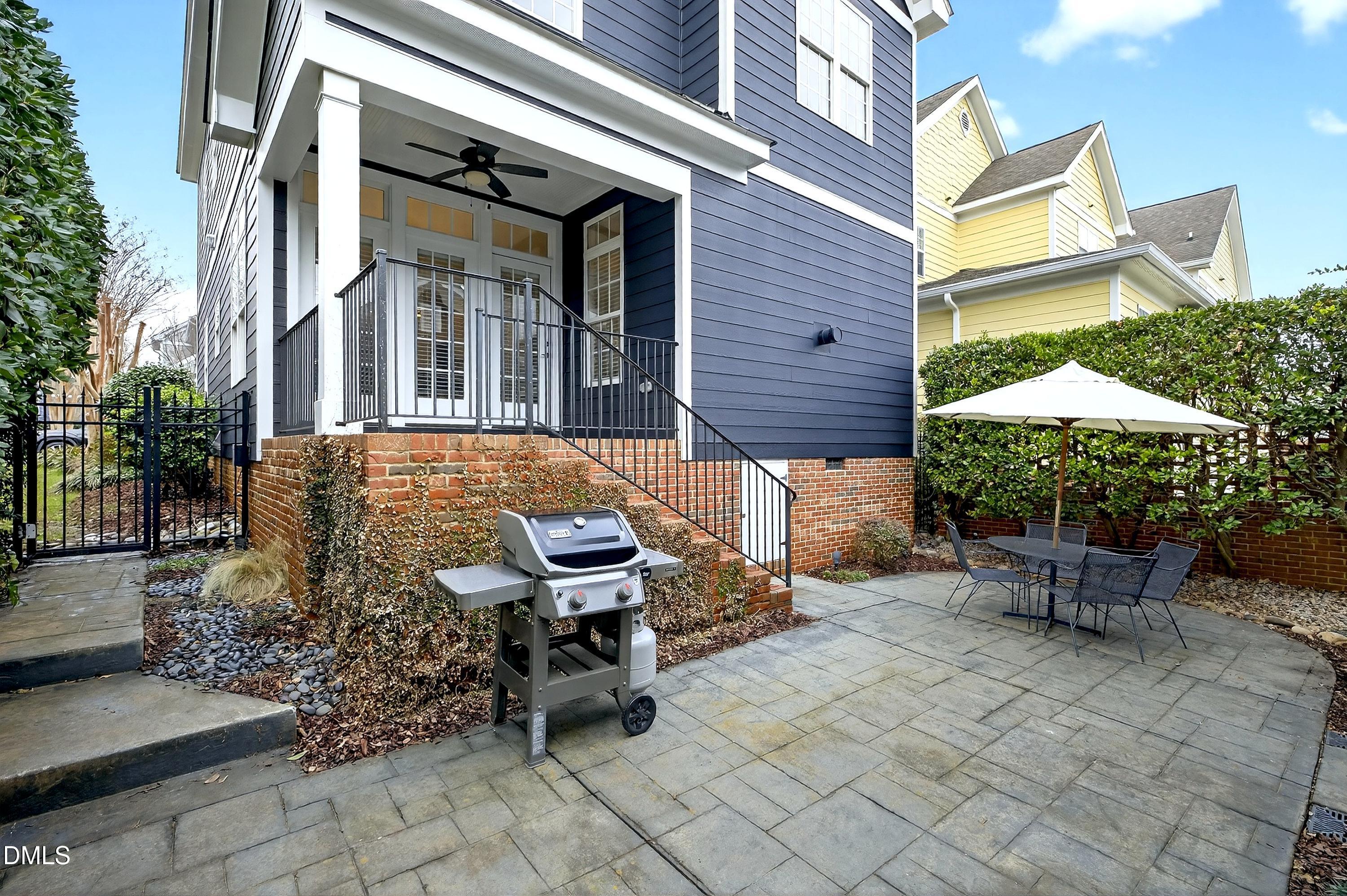 1168 Harp Street Raleigh, NC 27604 - Photo 39 of 45 a wooden bench sitting in front of a building