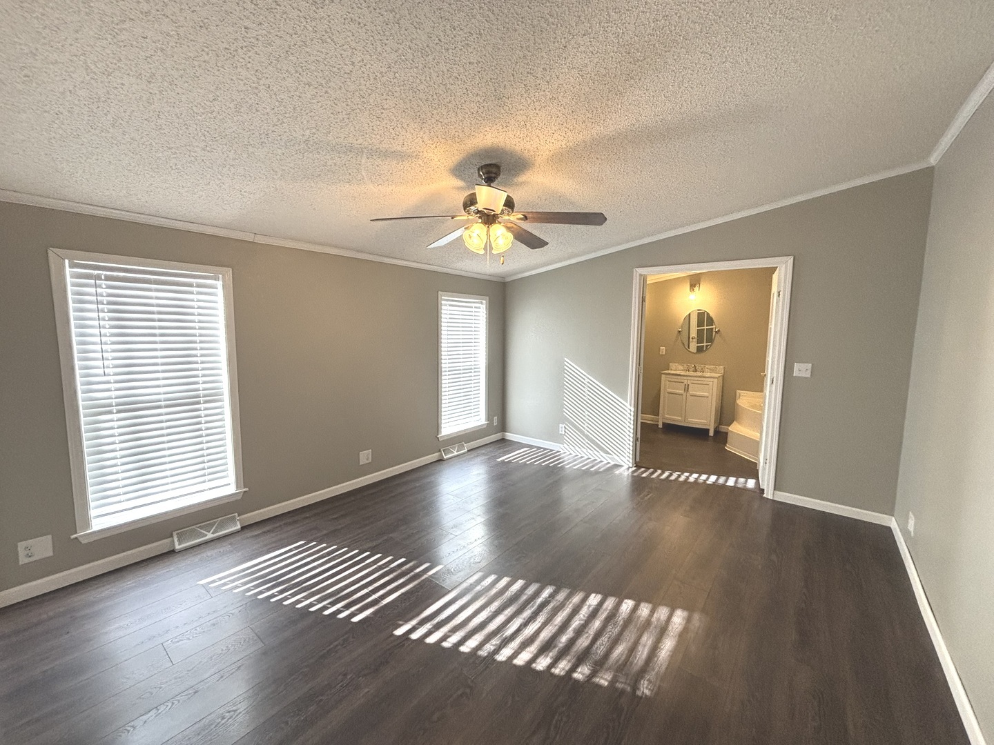 4120 Bannister Road Salem, IL 62881 - Photo 12 of 20 a view of an empty room with window and wooden floor
