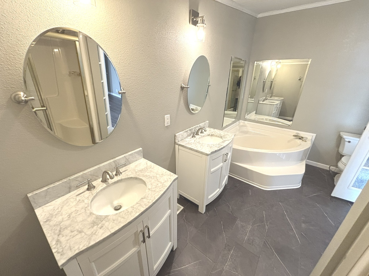 4120 Bannister Road Salem, IL 62881 - Photo 14 of 20 a bathroom with a double vanity sink mirror and toilet