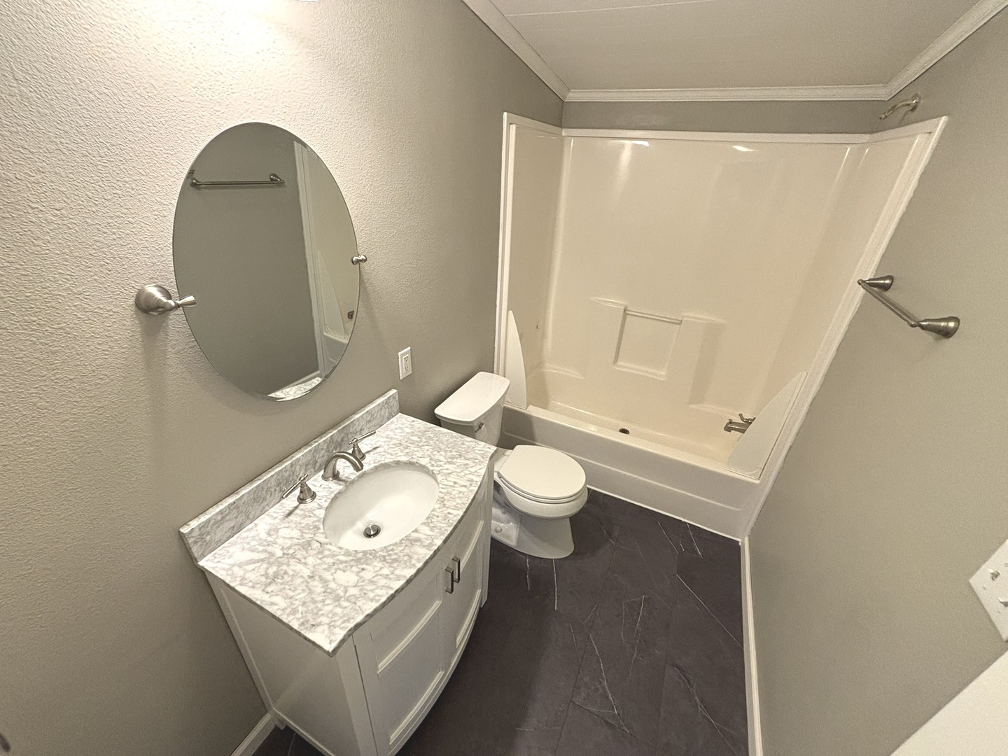 4120 Bannister Road Salem, IL 62881 - Photo 16 of 20 a bathroom with a sink a toilet and shower