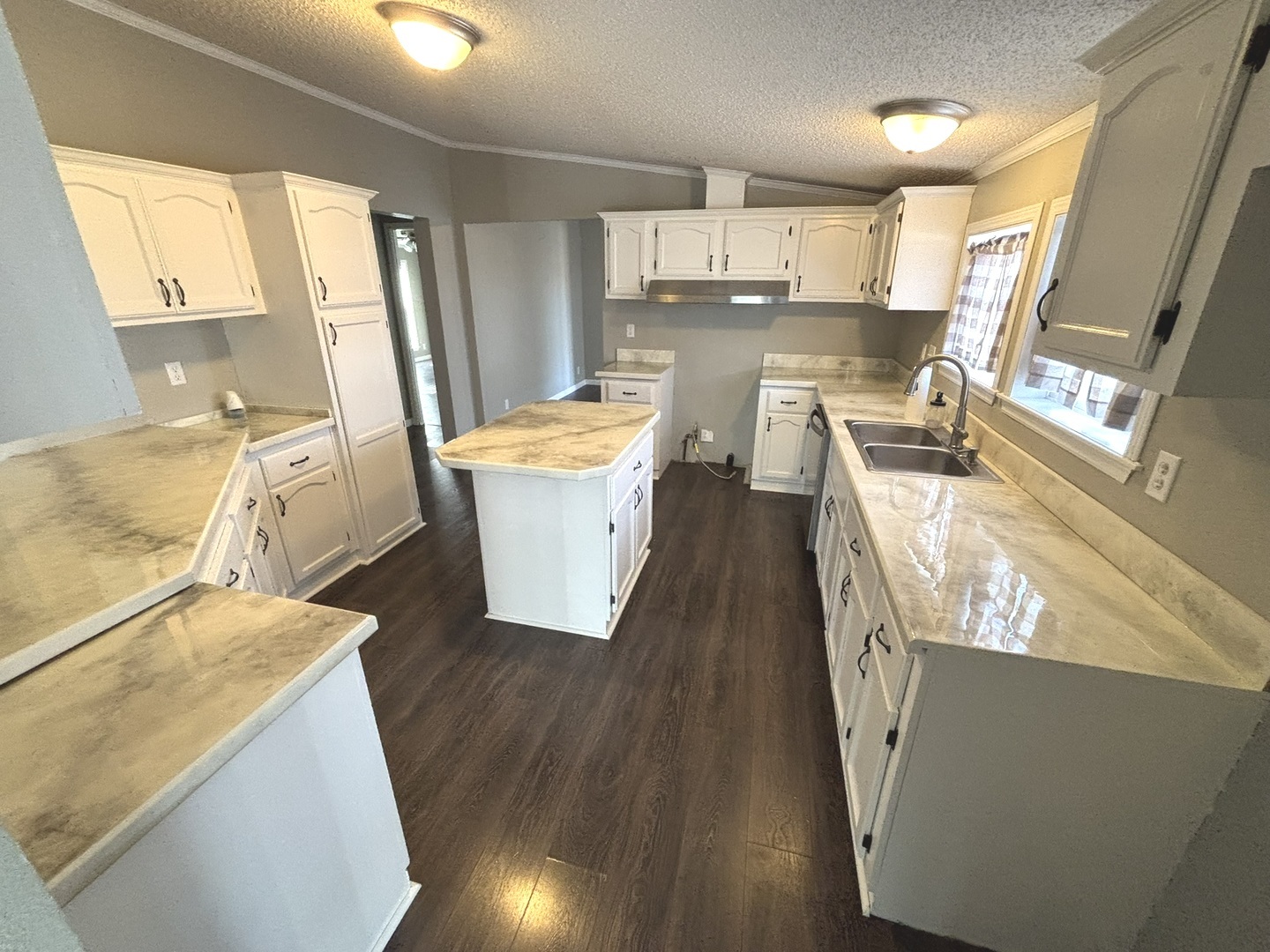 4120 Bannister Road Salem, IL 62881 - Photo 6 of 20 a kitchen with a sink appliances and wooden floor