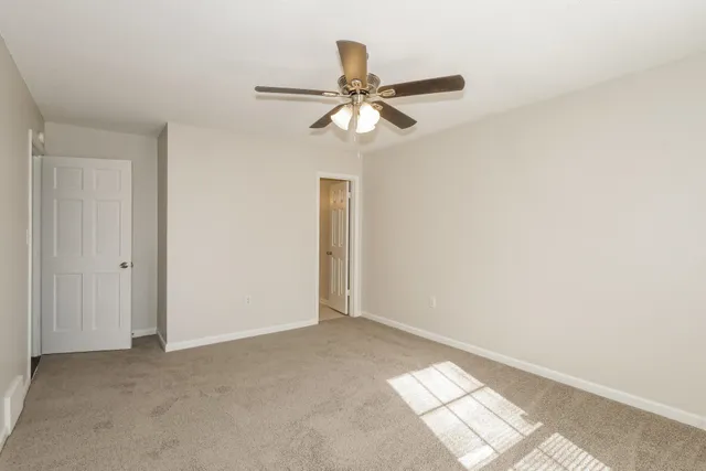 a view of an empty room and window
