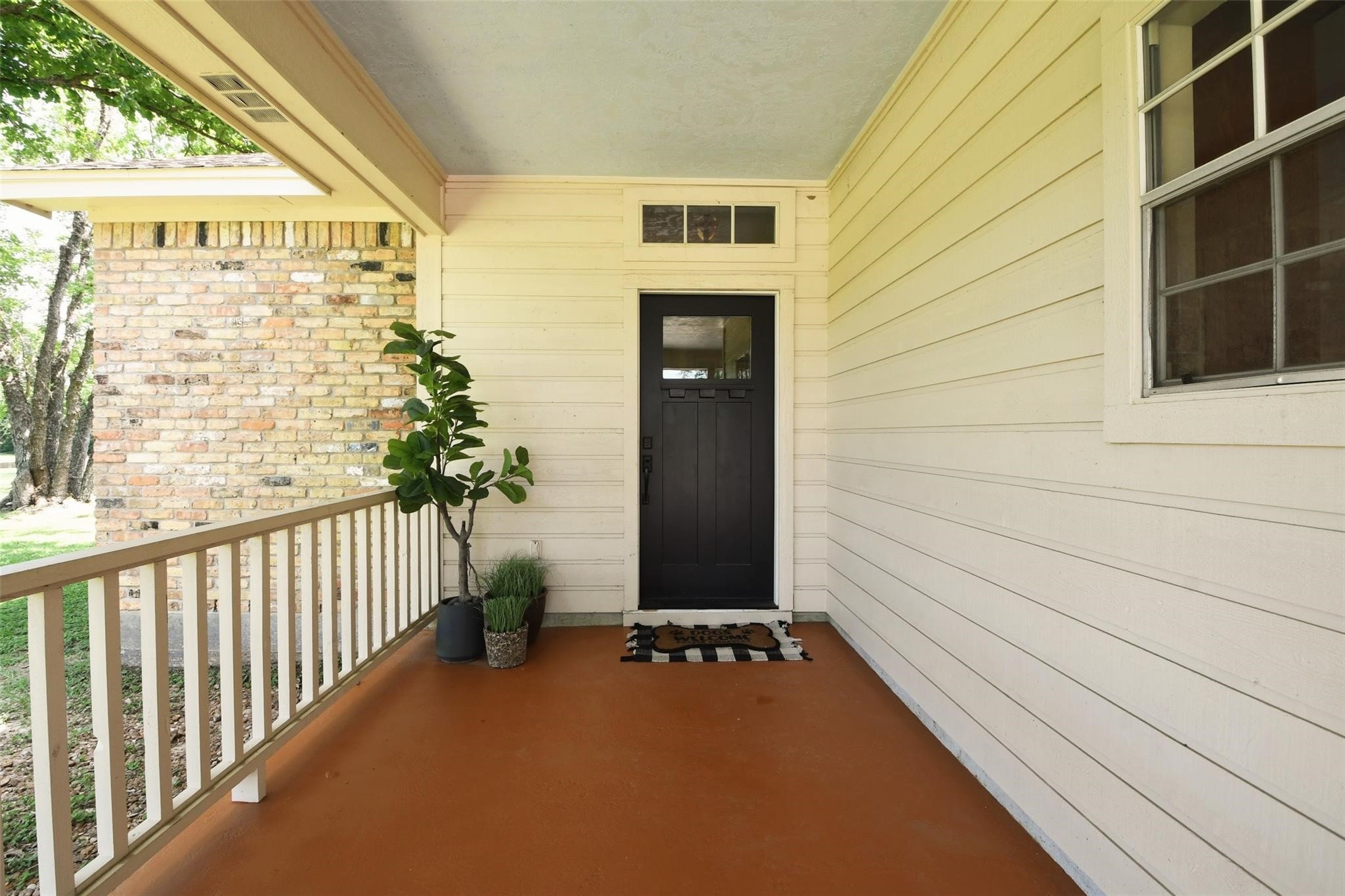 22035 Buescher Road Tomball, TX 77377 - Photo 11 of 44 a front view of a house with a yard