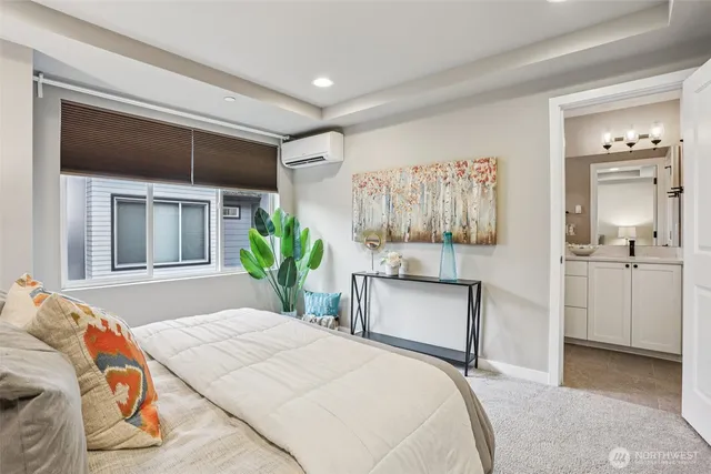 a bathroom with a double vanity sink mirror and shower