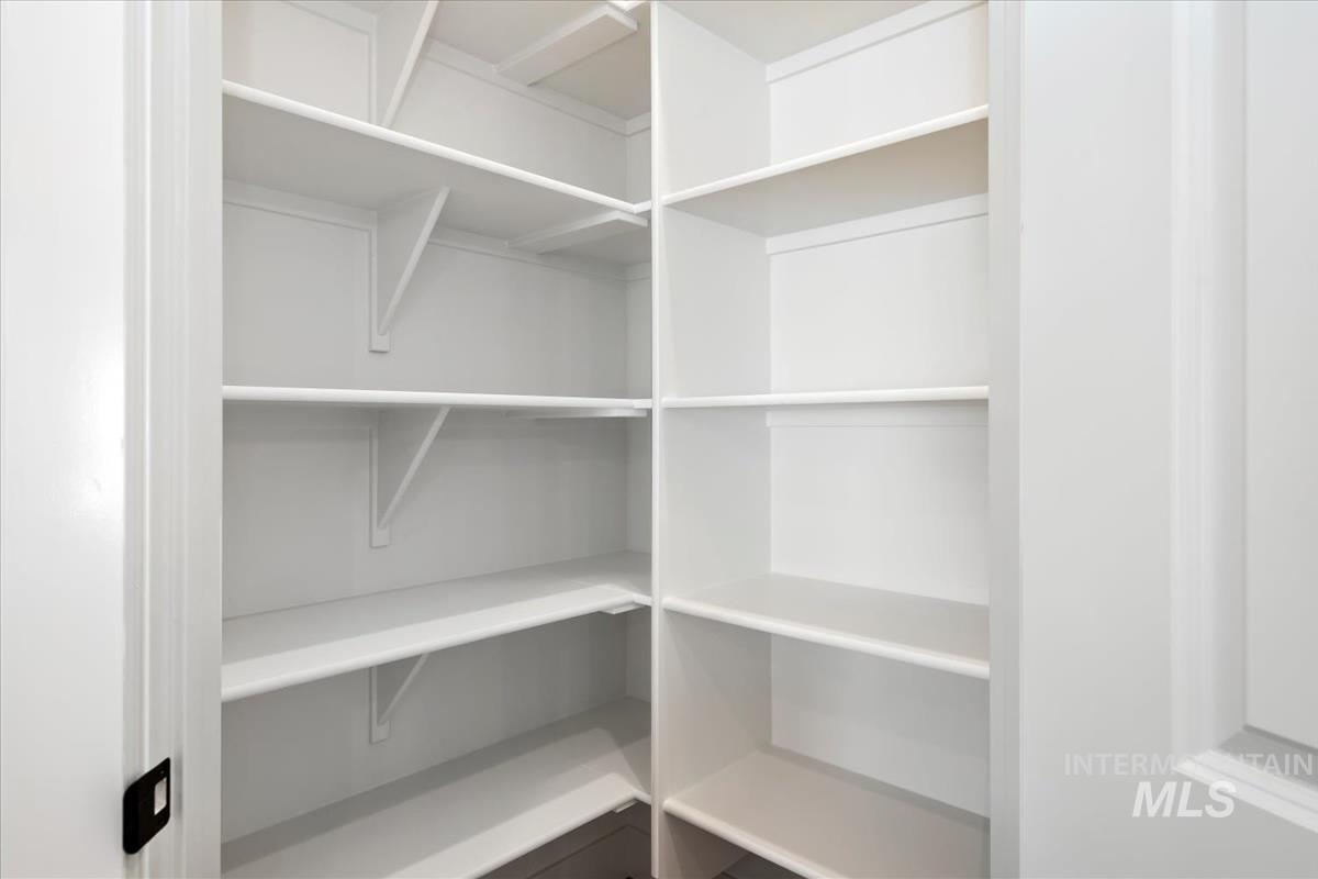 768 South Calhoun Lane Star, ID 83669 - Photo 17 of 36 Spacious pantry featuring multiple tiers of white shelving
