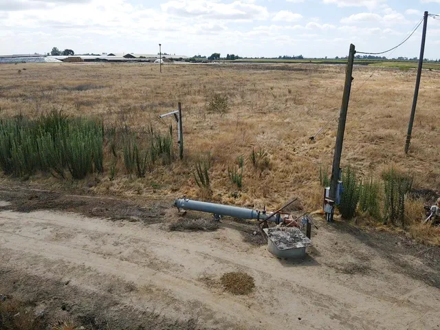 an aerial view of a house with outdoor space