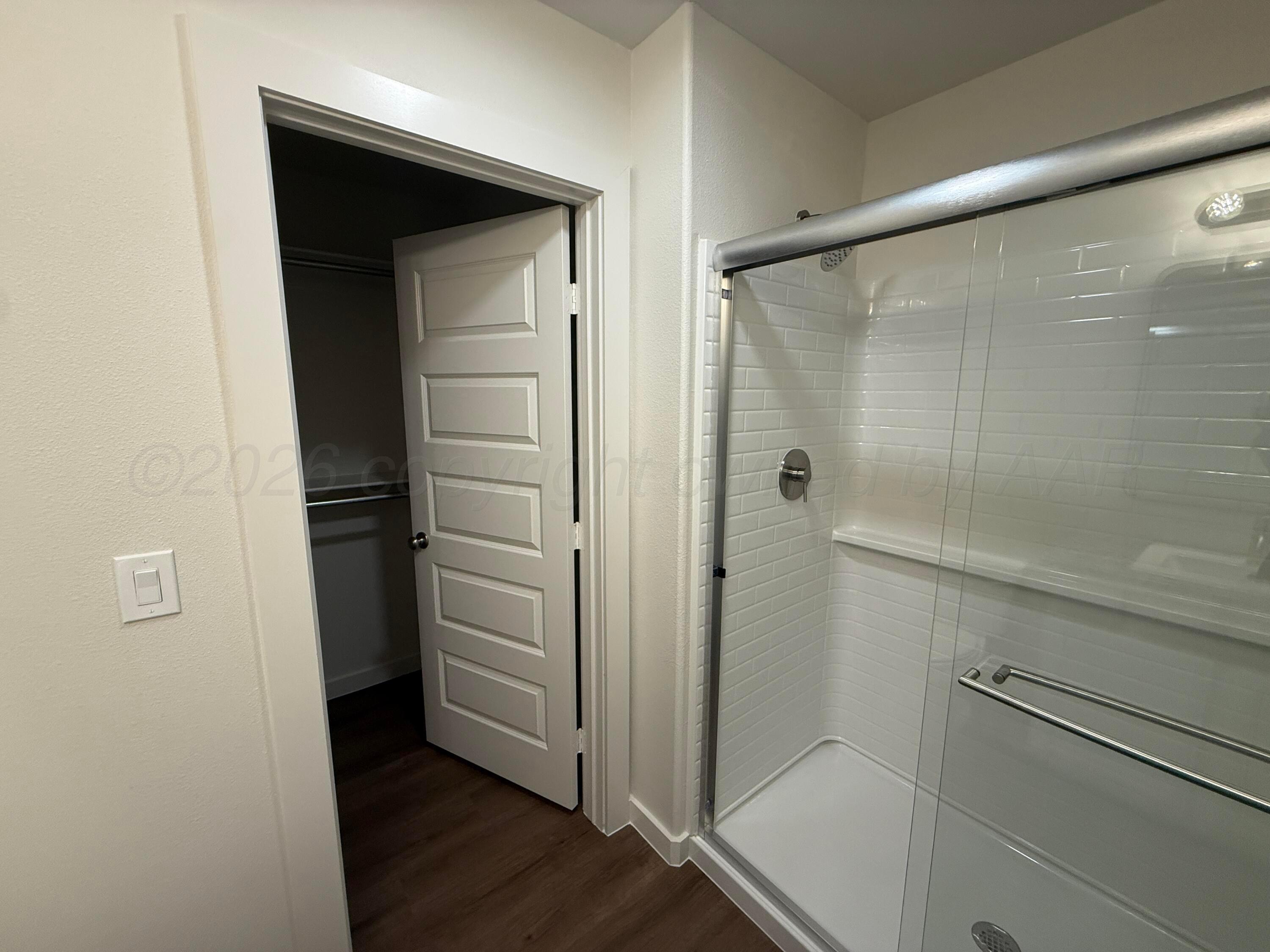 2911 Ranch House Road Amarillo, TX 79124 - Photo 14 of 18 a bathroom with a shower
