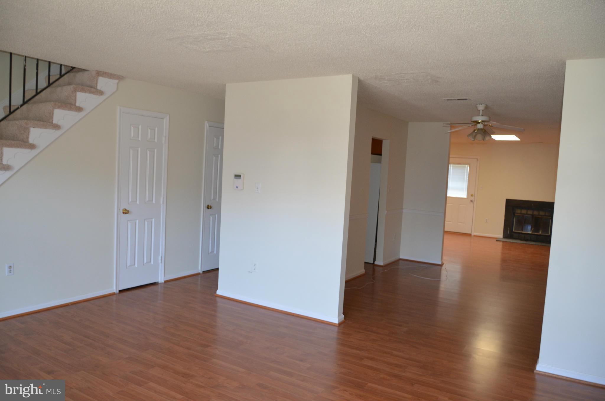 3626 Anchorage Cove Triangle, VA 22172 - Photo 3 of 11 a view of a hallway with wooden floor