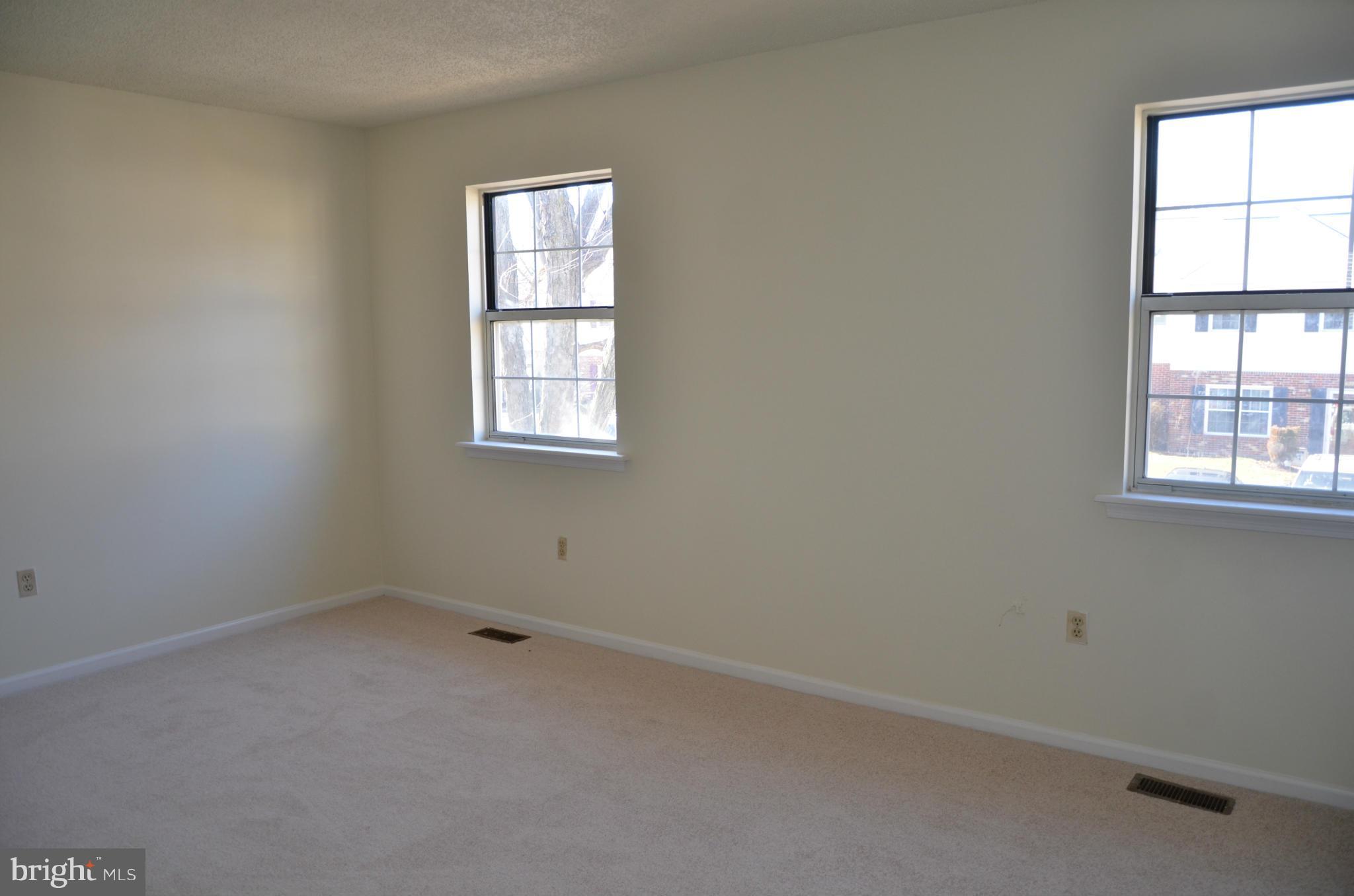 3626 Anchorage Cove Triangle, VA 22172 - Photo 7 of 11 an empty room with a window