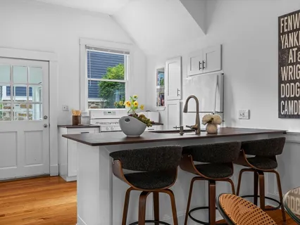 a view of a kitchen area with furniture and window