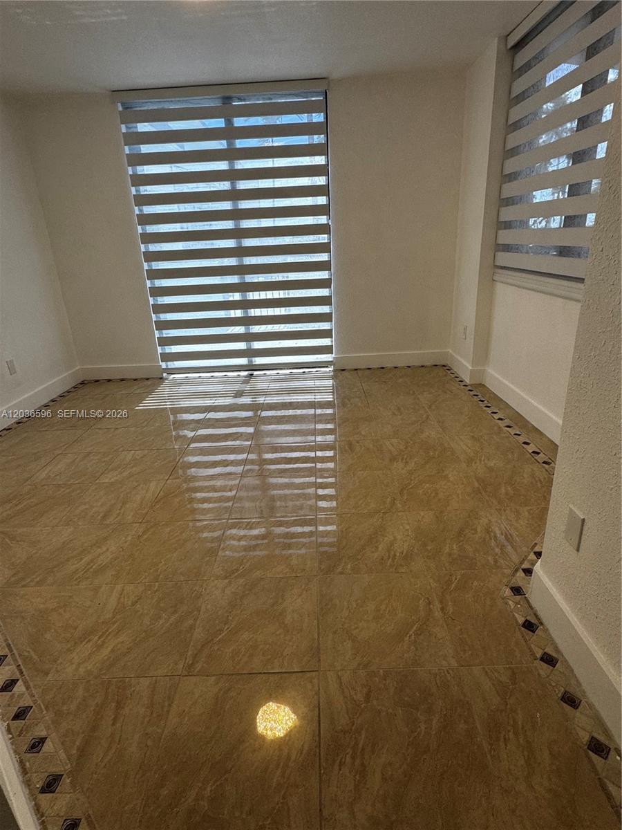 2301 Southwest 27th Avenue, Unit 503 Miami, FL 33145 - Photo 14 of 24 a bathroom with a shower