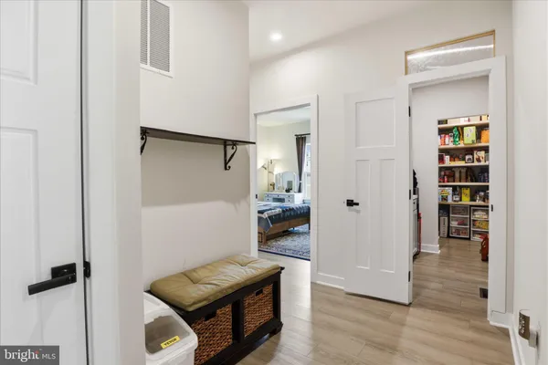 a bedroom with a bed and a table