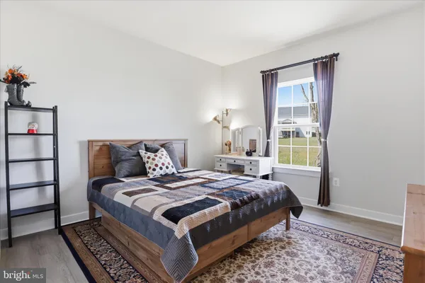 a view of livingroom with furniture and windows