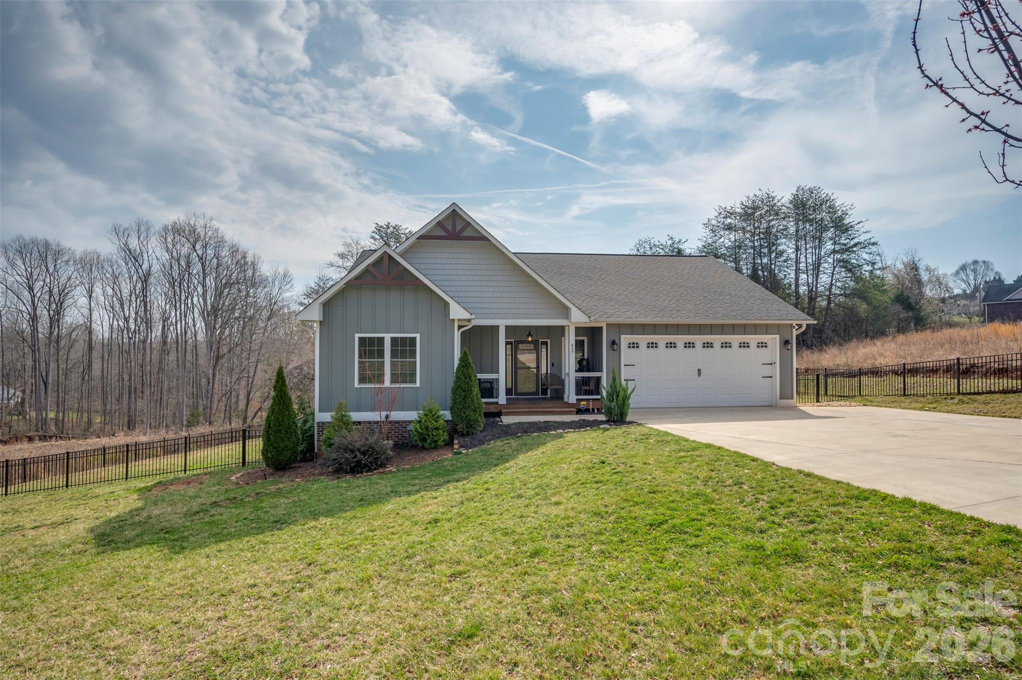 457 Edwards Street Extension Rutherfordton, NC 28139 - Photo 1 of 39 a house view with a garden space