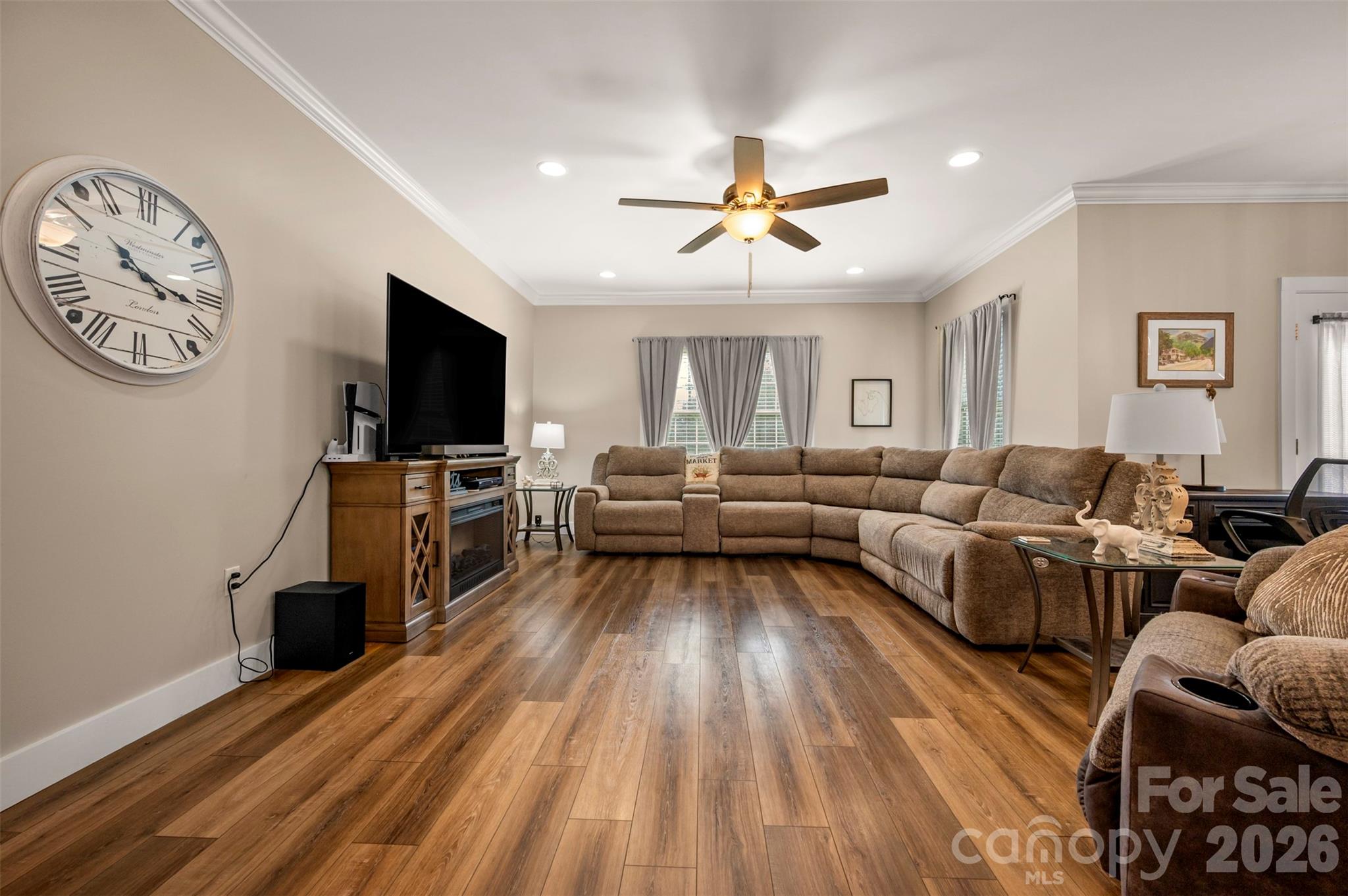 457 Edwards Street Extension Rutherfordton, NC 28139 - Photo 13 of 39 a living room with furniture and a flat screen tv