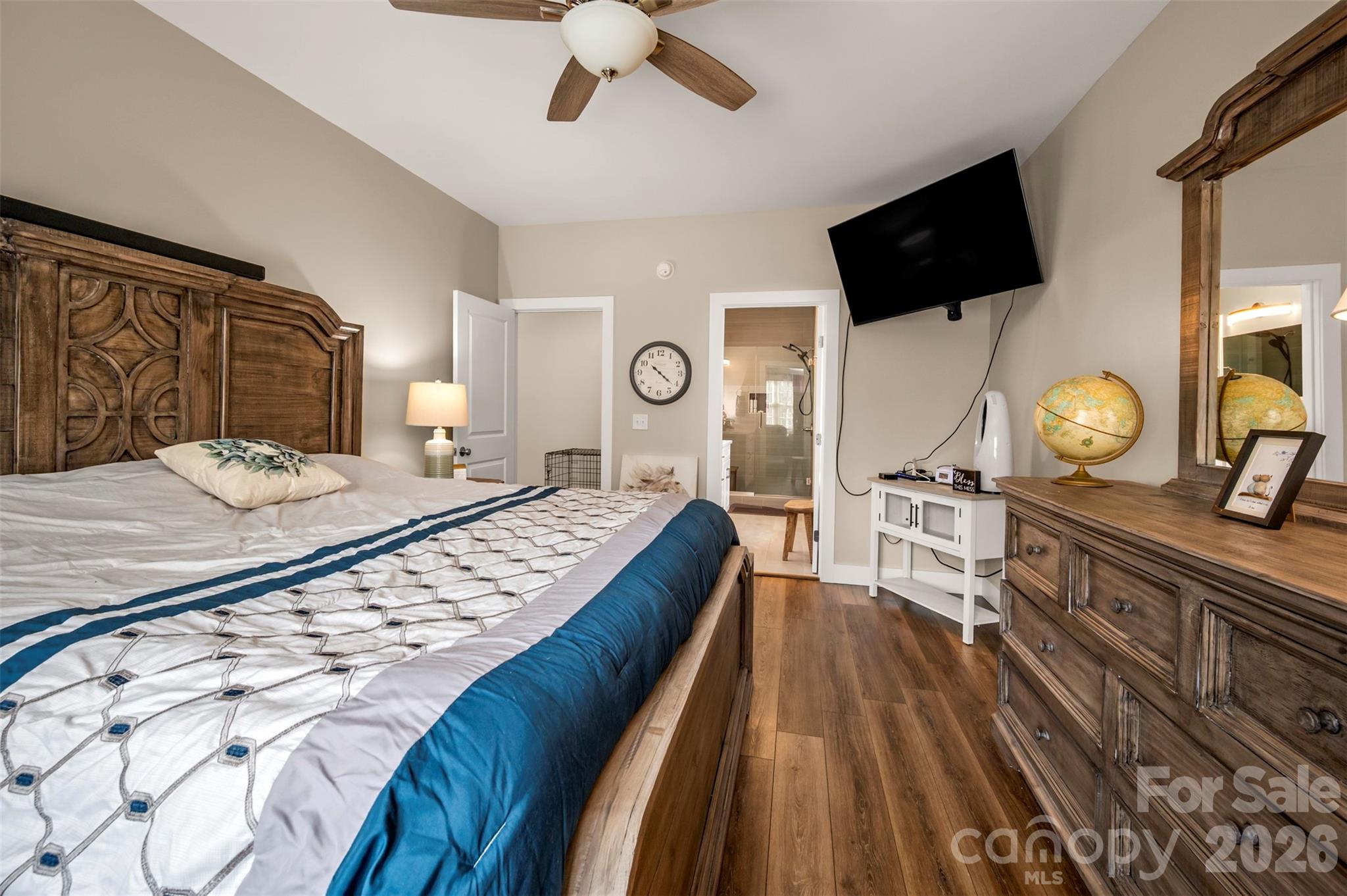 457 Edwards Street Extension Rutherfordton, NC 28139 - Photo 17 of 39 a living room with a bed and a flat screen tv