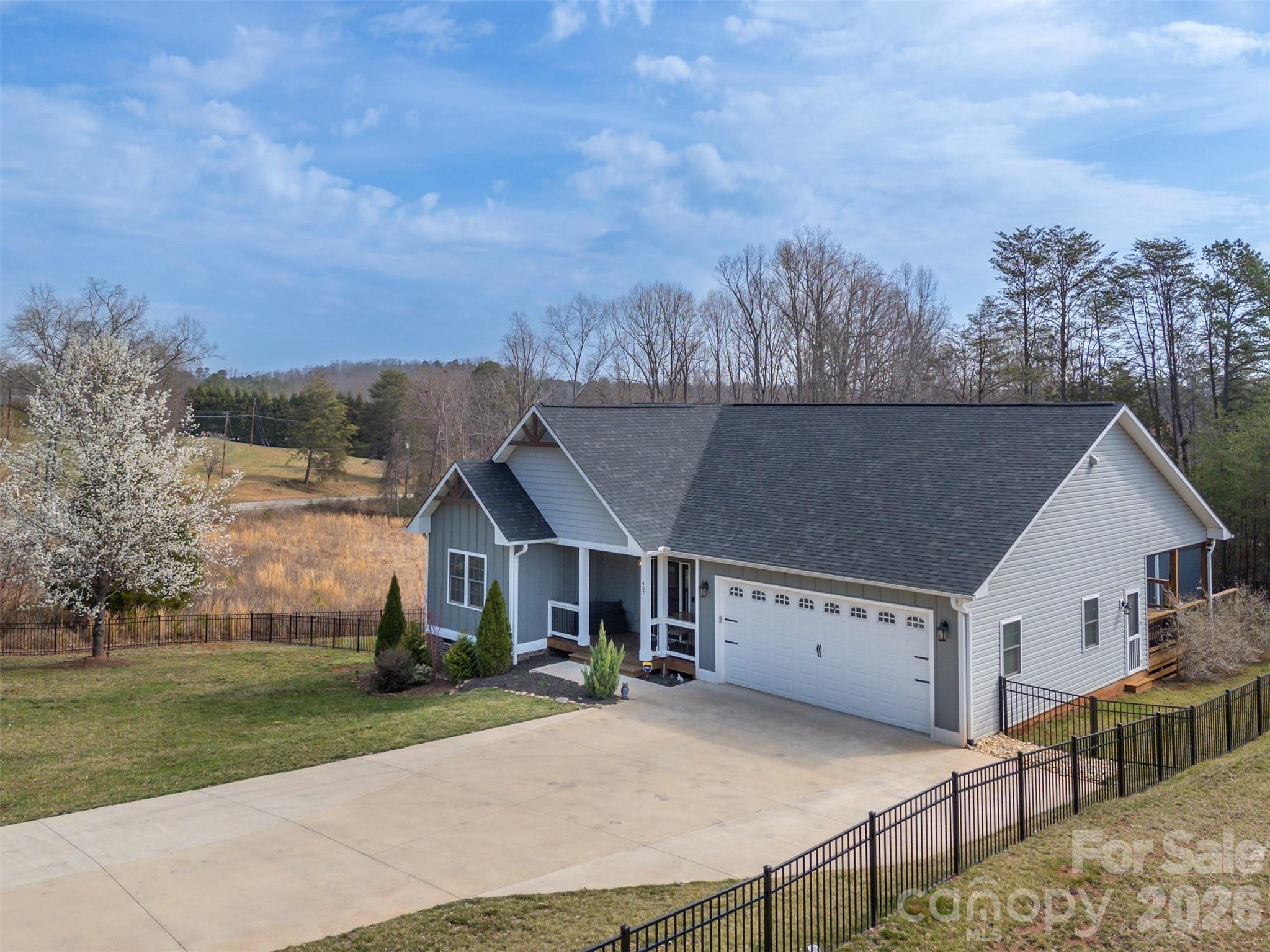 457 Edwards Street Extension Rutherfordton, NC 28139 - Photo 2 of 39 front view of house with a yard and trees in the background