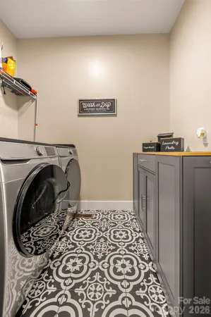a view of a utility room with washer and dryer