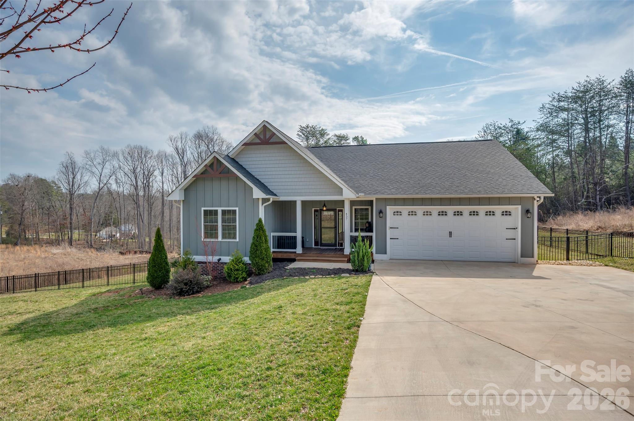 457 Edwards Street Extension Rutherfordton, NC 28139 - Photo 27 of 39 a view of a house with backyard and a garden