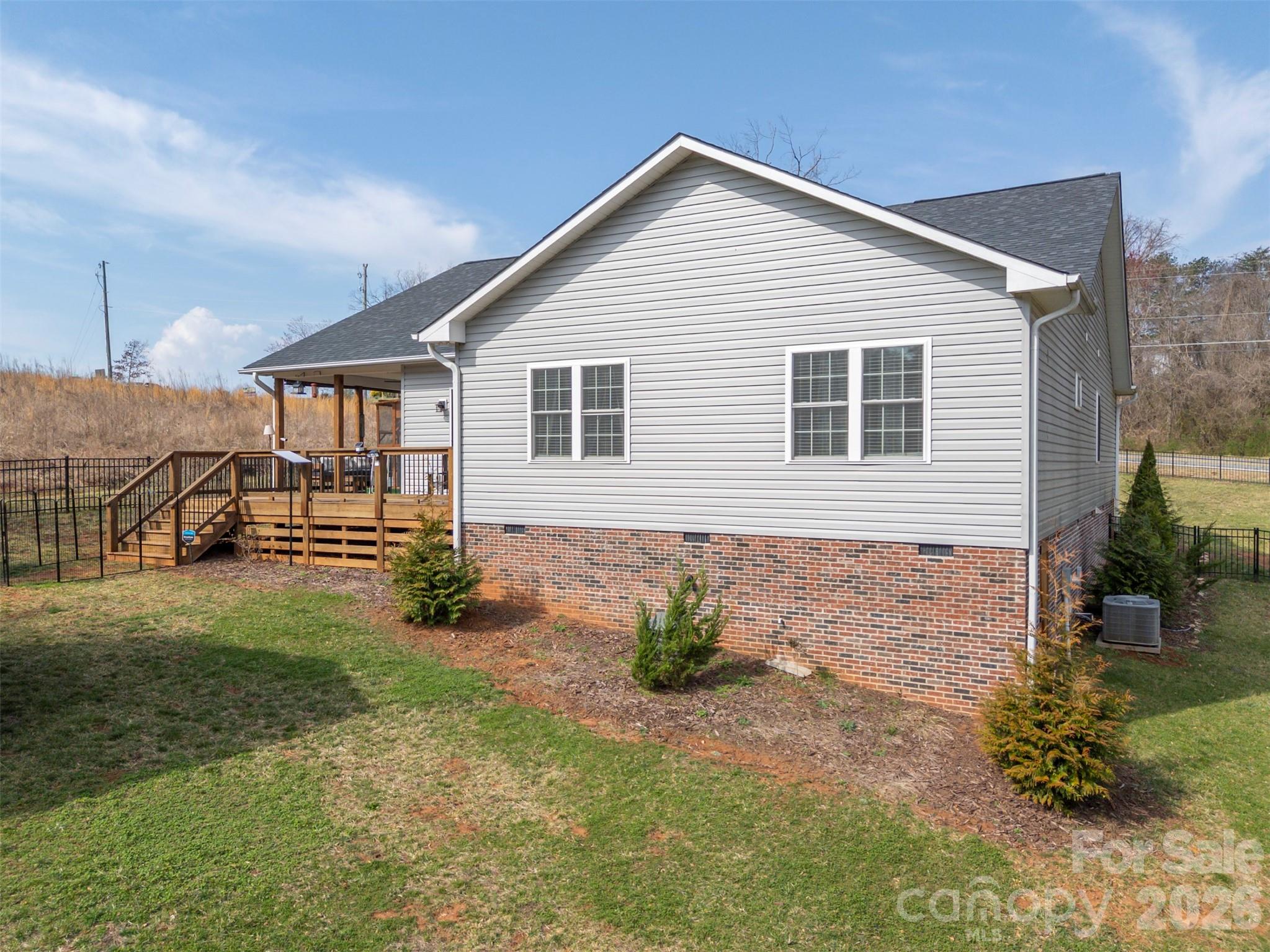 457 Edwards Street Extension Rutherfordton, NC 28139 - Photo 31 of 39 a view of a backyard of the house