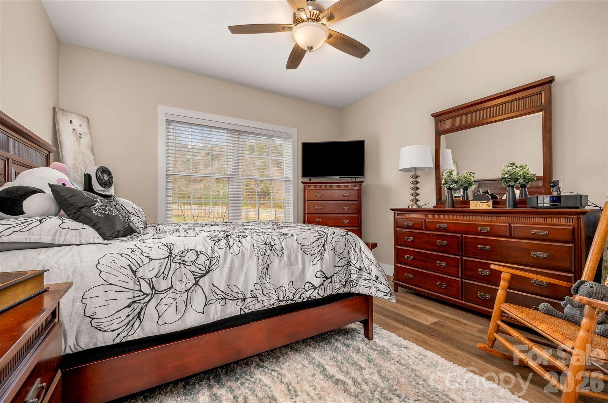457 Edwards Street Extension Rutherfordton, NC 28139 - Photo 9 of 39 a bedroom with a bed and a flat screen tv