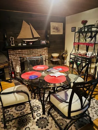 a room with furniture and air hockey table