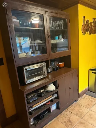 a room with table and chairs