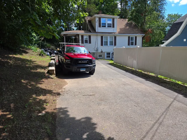a car parked in front of a house