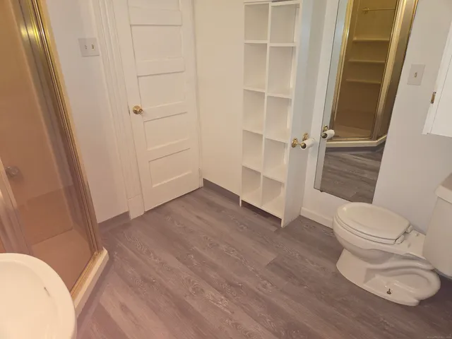 a bathroom with a toilet and a sink