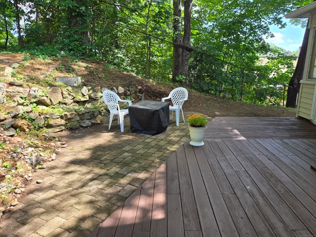 a view of a chairs and table on the wooden floor