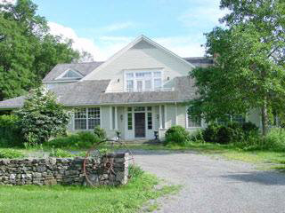 728 Bangall Amenia Road Millbrook, NY 12545 - Photo 2 of 7 a front view of a house with garden