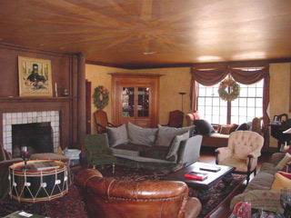 728 Bangall Amenia Road Millbrook, NY 12545 - Photo 4 of 7 a living room with furniture fireplace and a large window