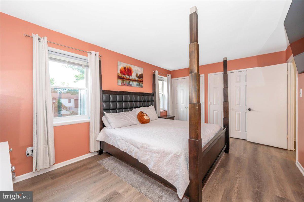 8826 Stauffer Road Walkersville, MD 21793 - Photo 23 of 38 a bedroom with a bed and a large window