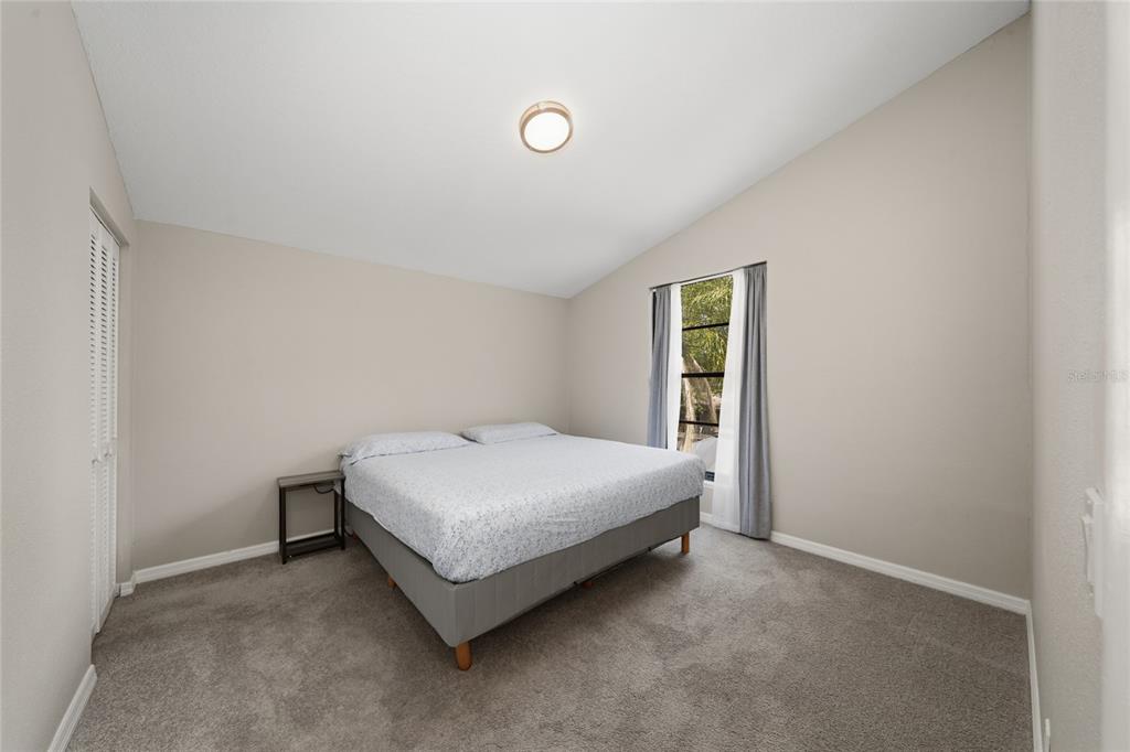 357 Ridgewood Street Altamonte Springs, FL 32701 - Photo 17 of 36 a room with a bed and window